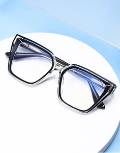 Macro view of cat-eye glasses frame with model number 19-142 C1 on the temple