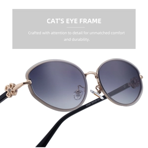 Detail of rose gold cat-eye sunglasses featuring a 3D floral hinge and gradient lenses