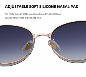 Detail of adjustable soft silicone nose pads on gold metal frame sunglasses