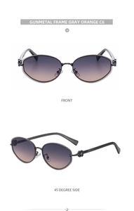 Detail view of gunmetal oval sunglasses with gray orange gradient lenses and metal frame