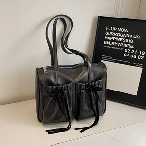 Retro black shoulder bag with velvet bows and pleated pockets in matte PU leather