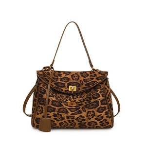 Leopard print commute tote bag with brown leather straps and gold twist lock clasp