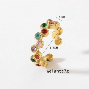 Close-up of vintage gold wave ring with multi-colored cubic zirconia and 0.6cm width detail