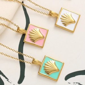 Three square scallop shell pendant necklaces in white, pink, and green enamel with gold chain