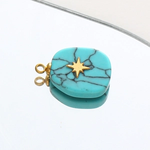 Vintage turquoise teardrop pendant with gold star inlay and stainless steel ring
