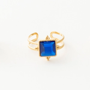 Detail of 18k gold plated vintage double layer ring with square blue zircon gemstone