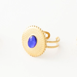 Vintage 18k gold plated stainless steel ring with blue zircon and textured sunburst disk