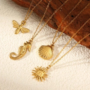 Gold-plated stainless steel necklaces with bee, seahorse, shell and sun pendants