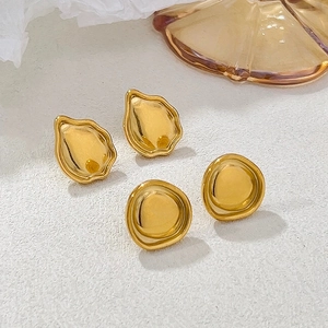 Golden irregular lava textured stud earrings set with metallic water drop and round shapes