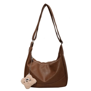 Minimalist large brown hobo tote bag with silver zipper and plush star charm