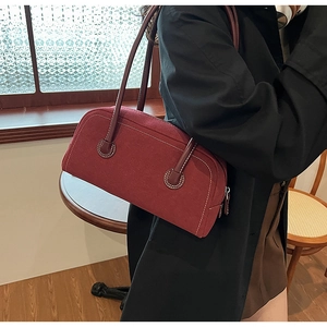 Retro burgundy faux suede Boston handbag with white contrast stitching for autumn office style
