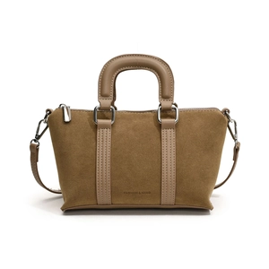 Brown frosted leather top-handle pillow bag with detachable shoulder strap and silver hardware