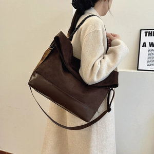 Retro large brown tote bag with dual-texture stitching and woven shoulder straps