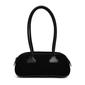 Minimalist black matte suede bowling bag with smooth leather handles for women