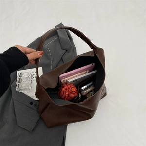 Large dark brown PU leather tote bag showing spacious interior with tablet and umbrella