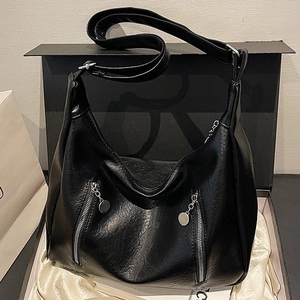 Large black vintage hobo bag with double zippers in a premium gift box presentation