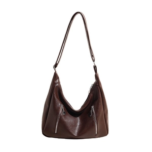 Retro dark brown hobo shoulder bag with silver decorative zippers on white background