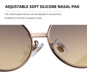Detail of adjustable soft silicone nose pads on rose gold metal frame sunglasses