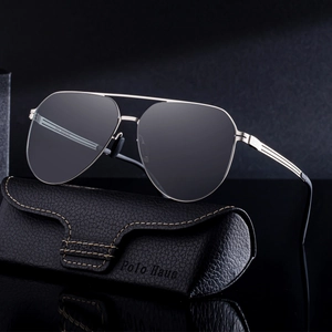 Classic aviator sunglasses with gold metal frame and polarized lenses including leather case