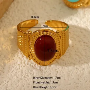 Vintage gold stainless steel ring with oval reddish-brown natural stone and open band
