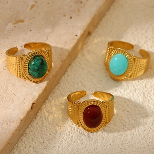 Vintage stainless steel open rings with natural oval stones in green, blue, and red colors