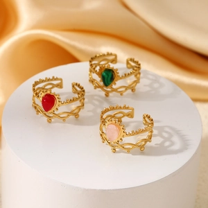 Three-piece set of vintage gold stainless steel open rings with teardrop gemstones