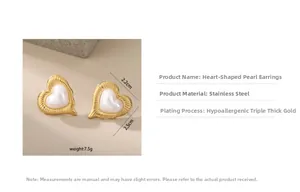 Detail of heart shaped earrings showing dimensions 2.2cm x 2.5cm and gold plated texture