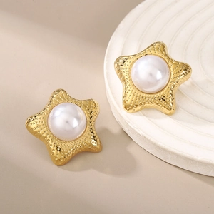 Elegant gold starfish pearl stud earrings with textured surface and vintage finish