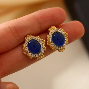 Boucles d'oreilles vintage en acier inoxydable avec pierre bleue et cristaux dorés à l'or 18K