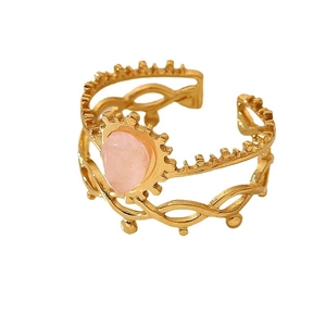 Vintage gold layered open ring with pink teardrop stone and intricate woven textures