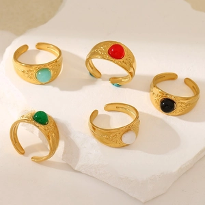 Set of five gold stainless steel adjustable rings with colorful natural stones