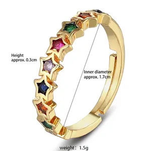 Detail of adjustable gold star ring with colorful zircon inlays and dimensions