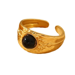 Adjustable gold stainless steel ring with black round stone and floral engravings