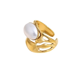 Irregular gold lava ring with large white pearl on white background, adjustable open size