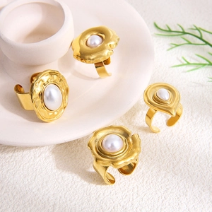 18K gold plated lava texture rings set with pearls in an irregular minimalist style