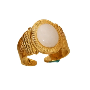 Vintage textured gold ring with oval white stone and radiant engraved patterns