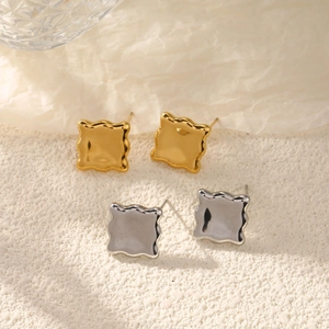 Polished gold and silver wavy square stud earrings set in a minimalist 18K design