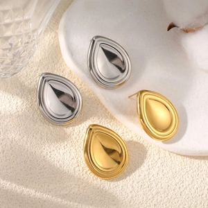 Boucles d'oreilles gouttes dorées et argentées au design géométrique minimaliste