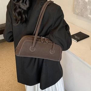Retro dark brown leather tote bag with white contrast stitching and double top handles