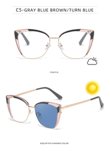 Cat-eye photochromic glasses showing clear lenses turning blue in outdoor sunlight