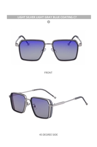 Macro detail of square silver metal sunglasses with gradient blue lenses and gray temple tips