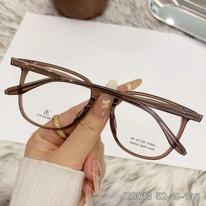 Square acetate eyeglasses frame in brown tortoise finish with woven texture temples