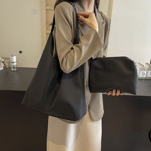 Large black leather tote bag and pouch set for women commute and stylish daily use
