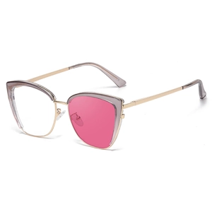 Modern cat-eye sunglasses with gold metal frame and stylish gradient lenses for women
