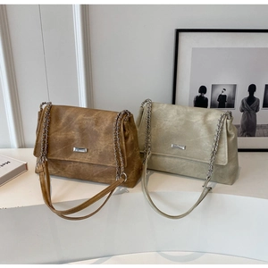 Minimalist chain tote bags in brown and beige with vintage leather texture and metal logo