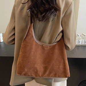 Brown suede hobo shoulder bag with adjustable leather strap for daily office commute