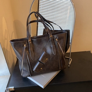 Vintage large brown tote bag in oil-waxed leather with side zippers for women