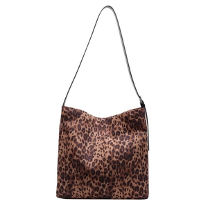 Leopard print large capacity tote bag with black leather strap on a white background