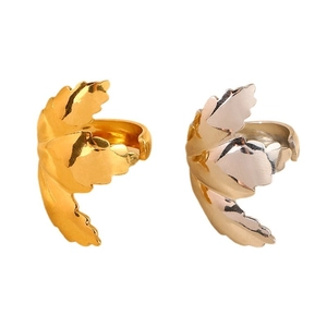 Irregular gold and silver leaf-shaped open rings with detailed natural vein textures