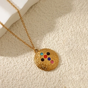 Golden titanium steel compass necklace with embossed round pendant and colorful gemstones